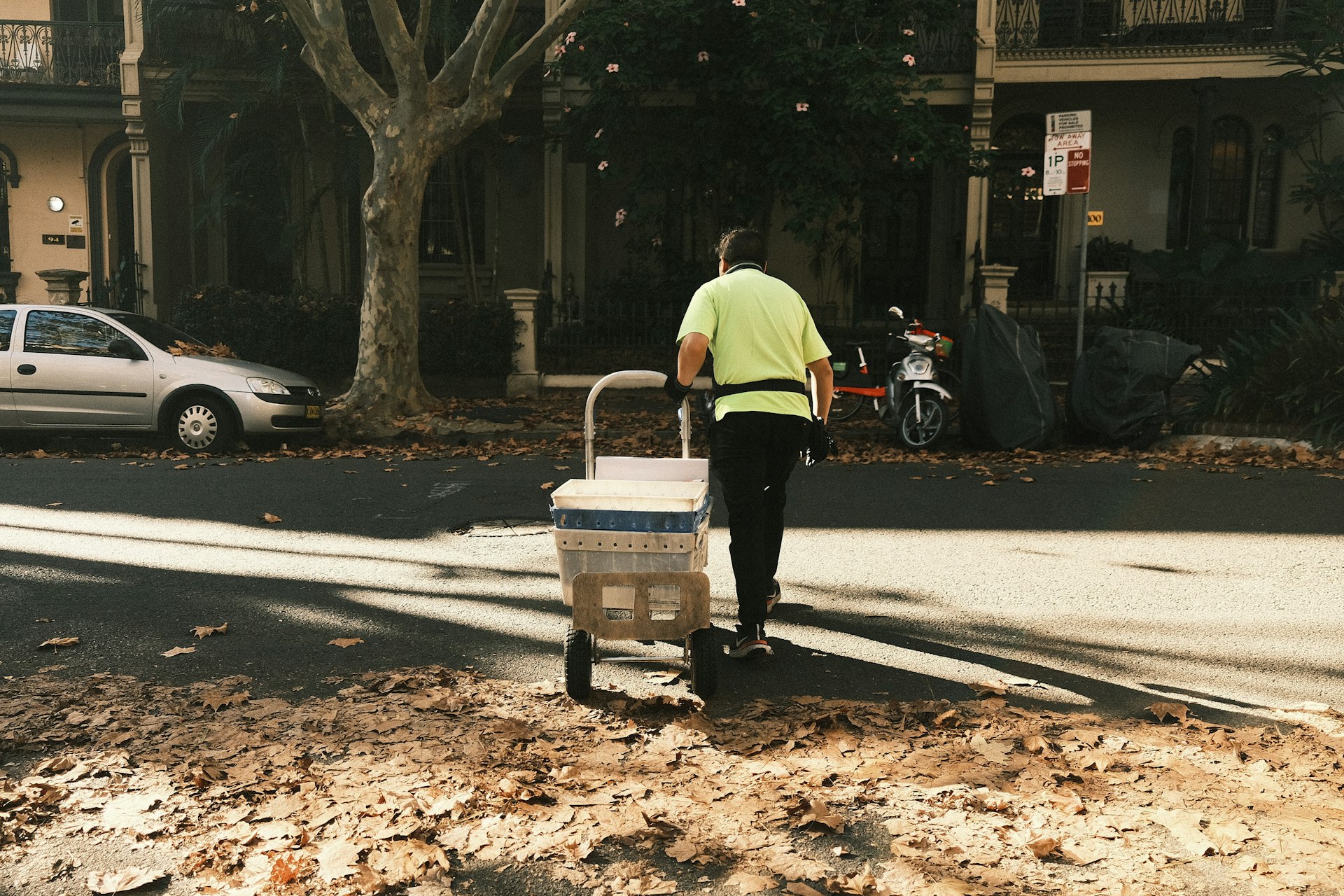 a man pushing a cart